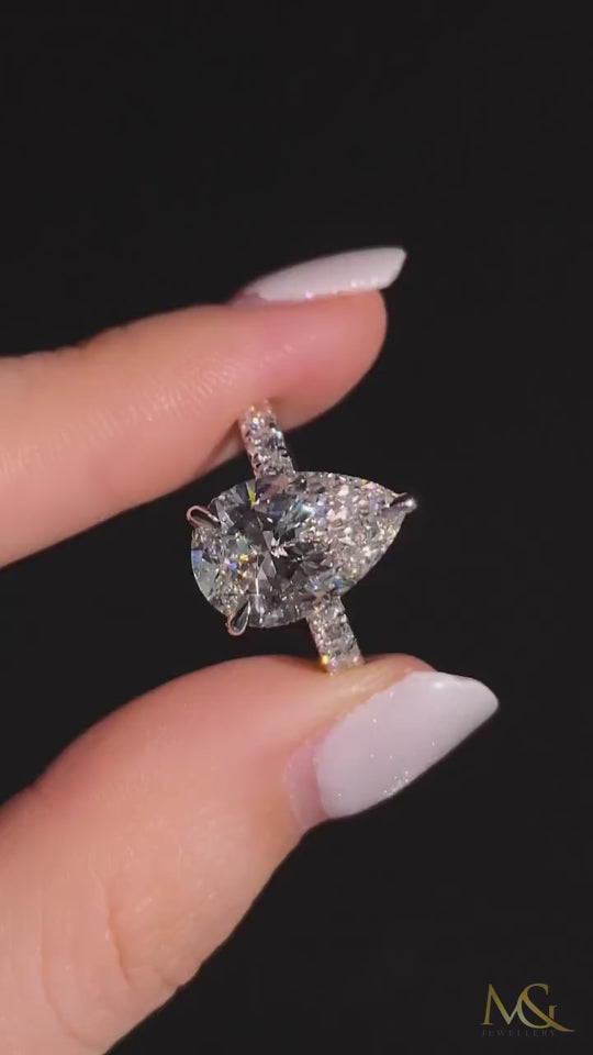 M&G Jewellery 3.5ct pear engagement ring shown in hand
